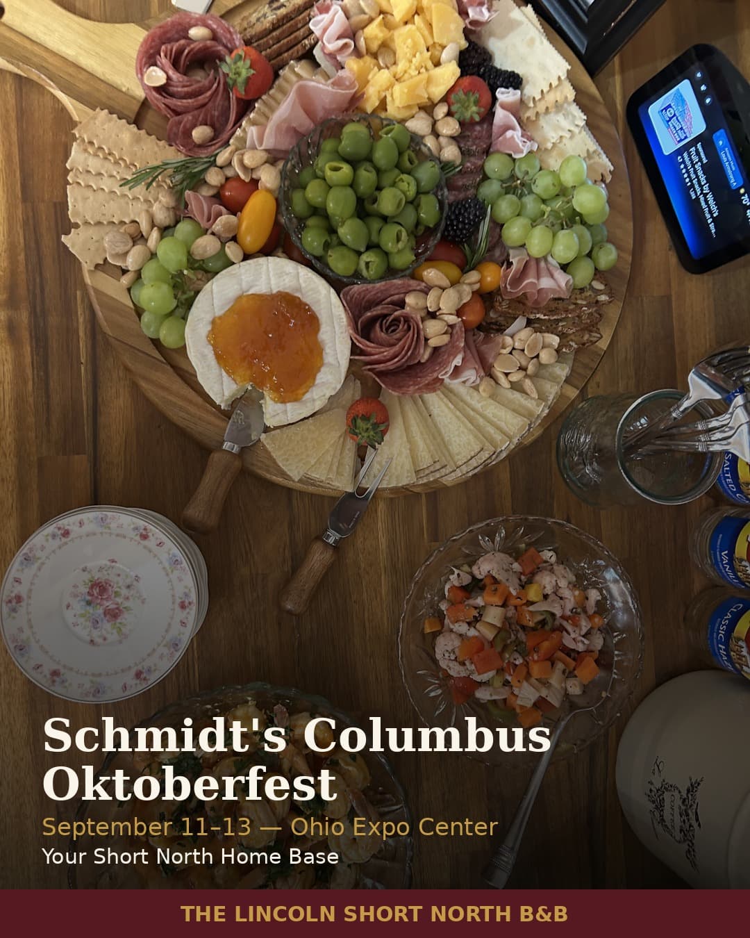A beautifully arranged charcuterie board featuring various cheeses, meats, fruits, and nuts alongside event details for Schmidt's Columbus Oktoberfest.