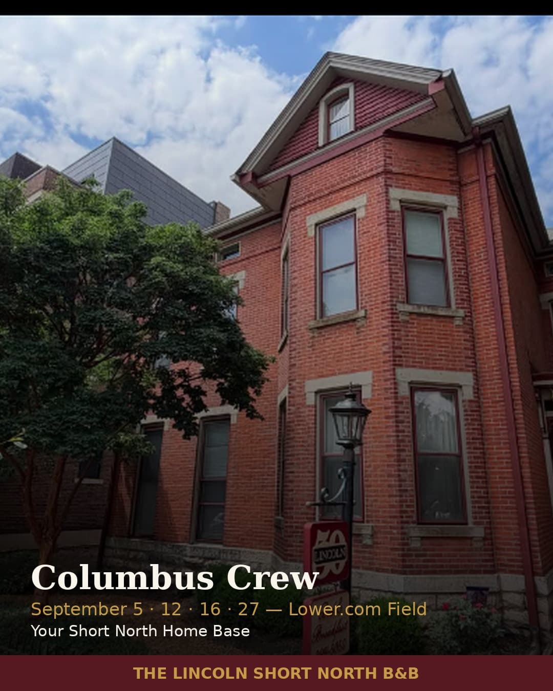 A red brick bed and breakfast building surrounded by trees, featuring a lamp post and signage for the Columbus Crew. A red brick bed and breakfast building surrounded by trees, featuring a lamp post and signage for the Columbus Crew.